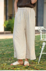 Bild in Galerie-Viewer laden, Pure Linen Artistic Cropped Pants - Summer New Solid Color Drawstring Pocket Wide Leg Pants
