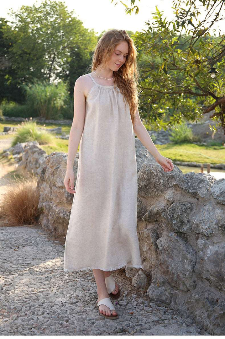 Natural linen dress from VIENI, featuring a relaxed fit and timeless design