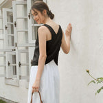 Load image into Gallery viewer, Women&#39;s linen tank top with open back from VIENI, ideal for warm weather fashion
