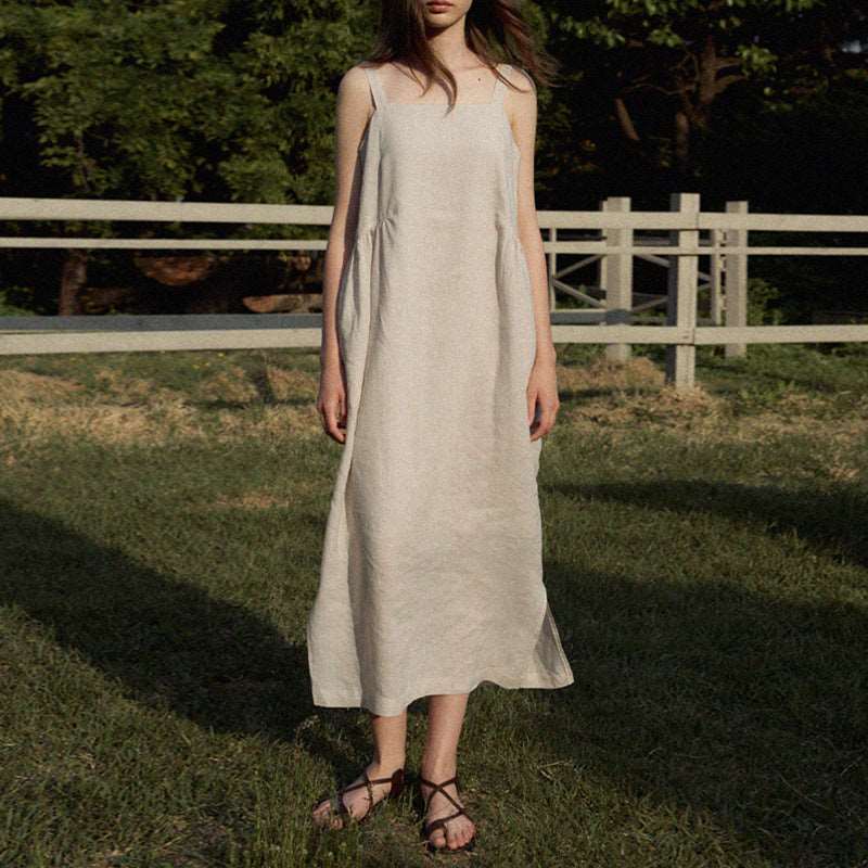 VIENI's Tencel-linen maxi dress with elegant draping, perfect for summer